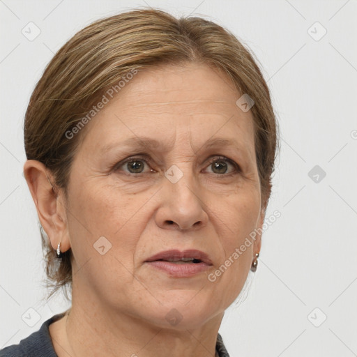 Joyful white adult female with medium  brown hair and grey eyes