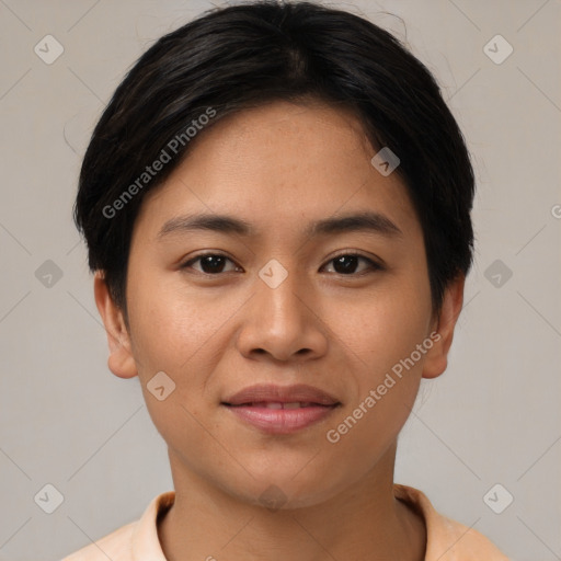 Joyful asian young-adult female with short  black hair and brown eyes