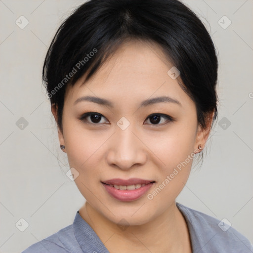 Joyful asian young-adult female with medium  black hair and brown eyes