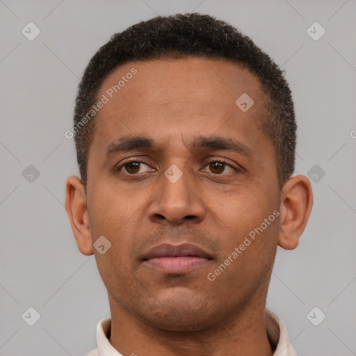 Neutral latino young-adult male with short  brown hair and brown eyes