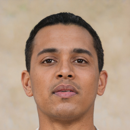 Neutral latino young-adult male with short  black hair and brown eyes