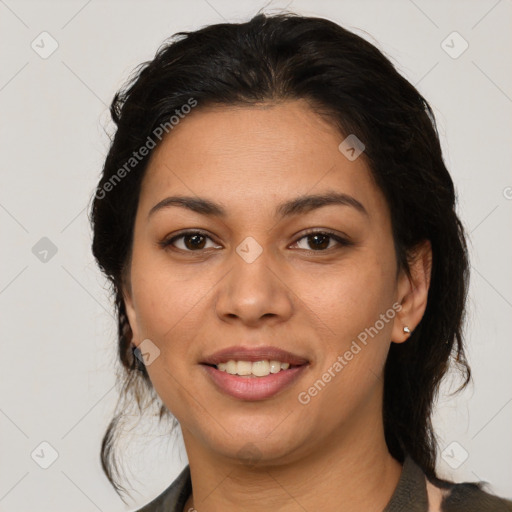 Joyful latino young-adult female with medium  brown hair and brown eyes