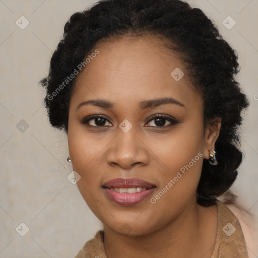 Joyful black young-adult female with long  brown hair and brown eyes