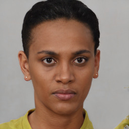 Neutral black young-adult female with short  black hair and brown eyes