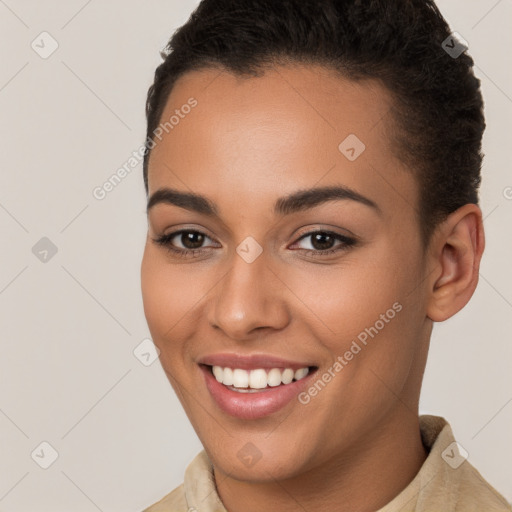 Joyful white young-adult female with short  brown hair and brown eyes