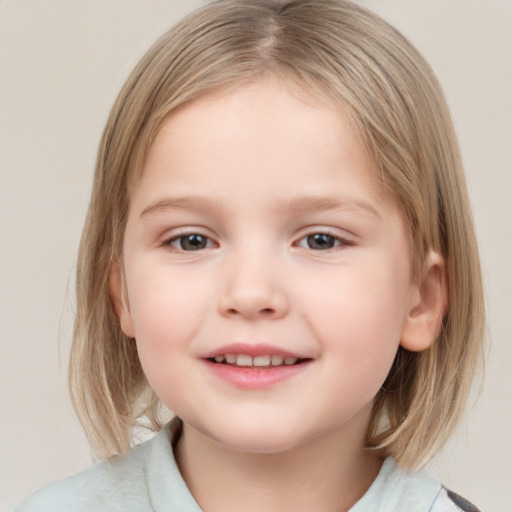 Joyful white child female with medium  brown hair and grey eyes