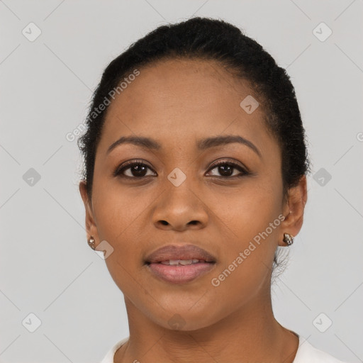 Joyful latino young-adult female with short  black hair and brown eyes