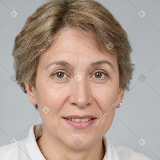 Joyful white adult female with short  brown hair and brown eyes