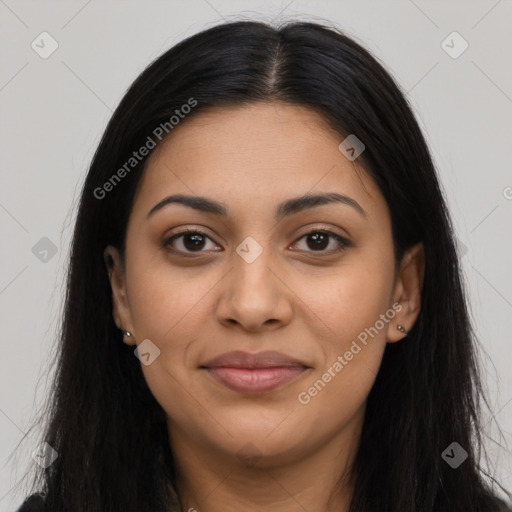 Joyful latino young-adult female with long  brown hair and brown eyes