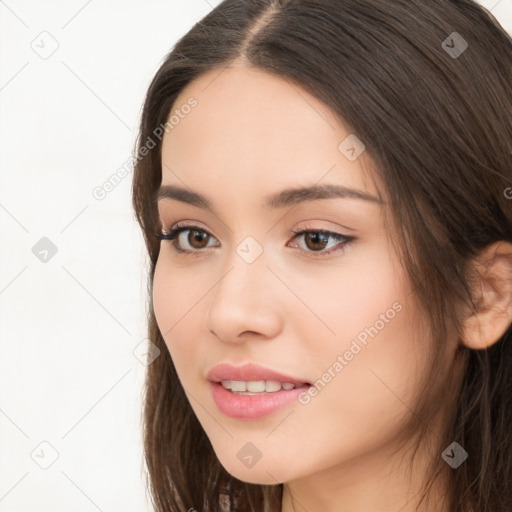 Neutral white young-adult female with long  brown hair and brown eyes