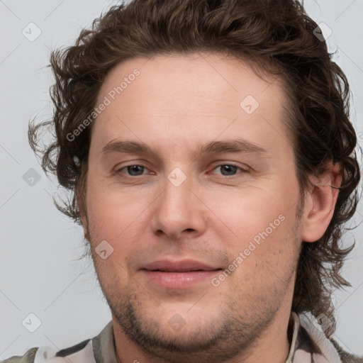 Joyful white young-adult male with medium  brown hair and brown eyes