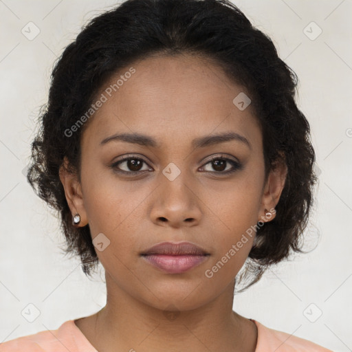 Neutral black young-adult female with medium  brown hair and brown eyes