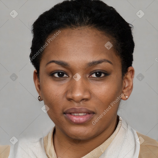 Joyful black young-adult female with short  black hair and brown eyes