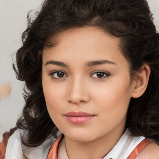 Joyful white child female with medium  brown hair and brown eyes