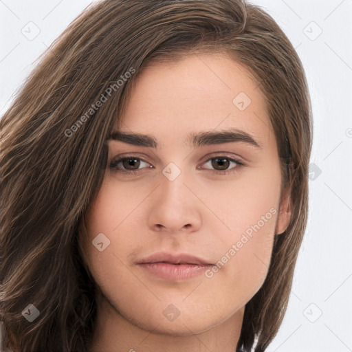 Neutral white young-adult female with long  brown hair and brown eyes