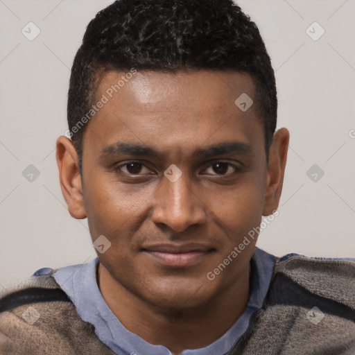 Joyful black young-adult male with short  black hair and brown eyes