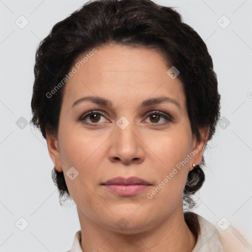 Joyful white adult female with short  brown hair and brown eyes