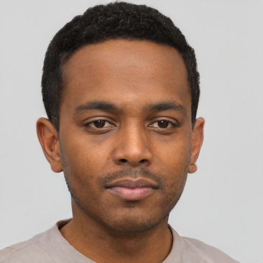 Neutral black young-adult male with short  black hair and brown eyes