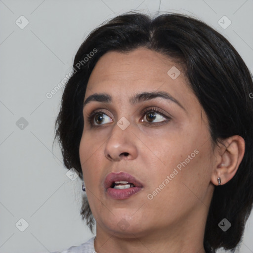Neutral asian young-adult female with medium  brown hair and brown eyes