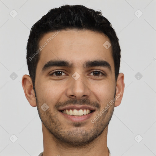 Joyful latino young-adult male with short  black hair and brown eyes