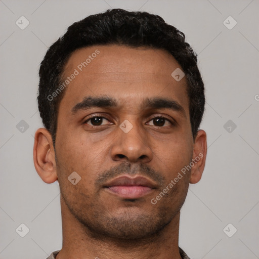 Neutral black young-adult male with short  black hair and brown eyes