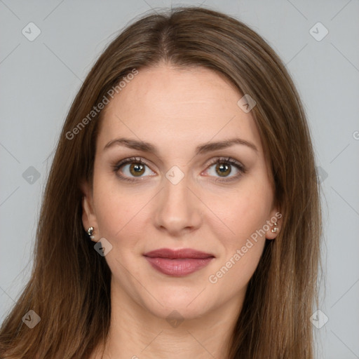 Joyful white young-adult female with long  brown hair and green eyes