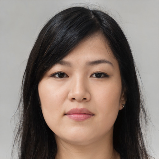 Neutral asian young-adult female with long  brown hair and brown eyes