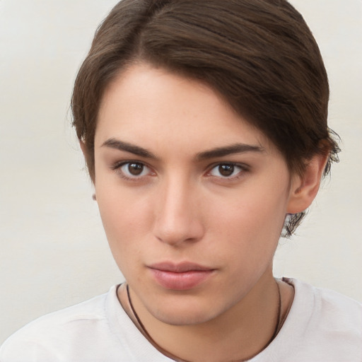 Neutral white young-adult female with short  brown hair and brown eyes