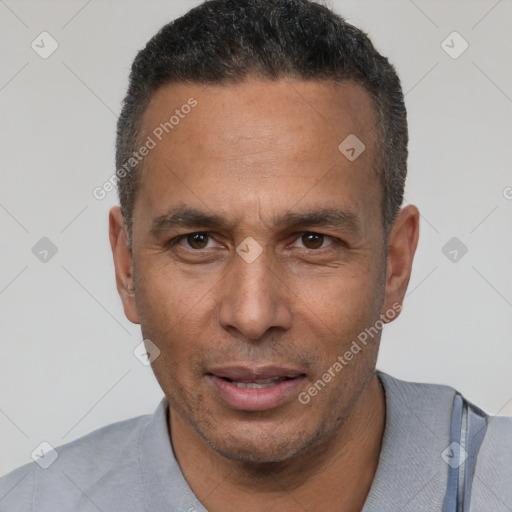 Neutral latino adult male with short  brown hair and brown eyes