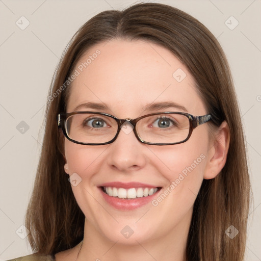 Joyful white young-adult female with long  brown hair and blue eyes