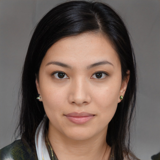 Joyful asian young-adult female with medium  brown hair and brown eyes