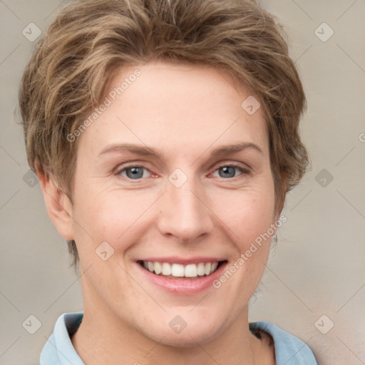 Joyful white young-adult female with short  brown hair and grey eyes