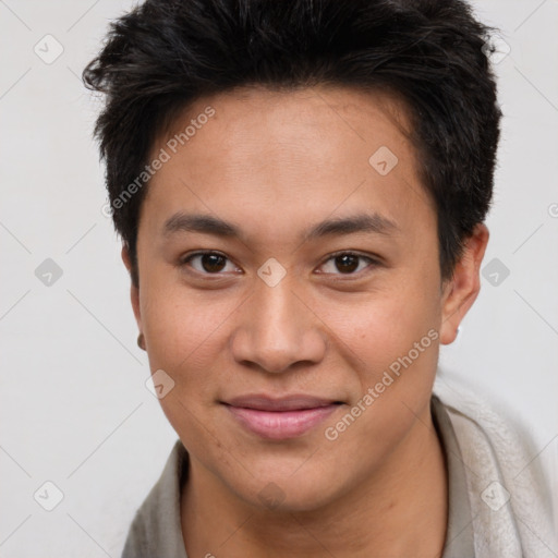 Joyful asian young-adult male with short  brown hair and brown eyes