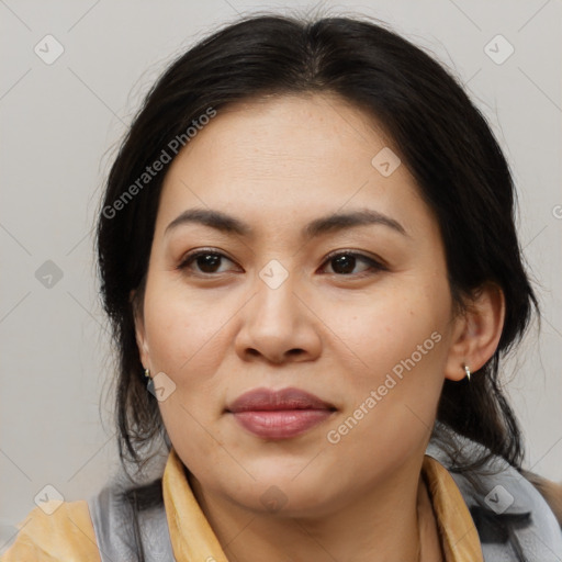 Joyful asian young-adult female with medium  brown hair and brown eyes