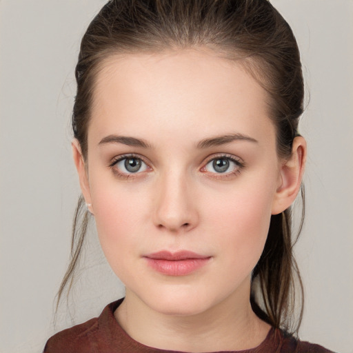 Neutral white young-adult female with medium  brown hair and grey eyes