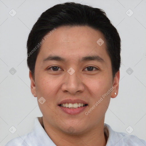 Joyful asian young-adult male with short  black hair and brown eyes