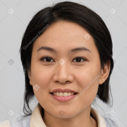 Joyful asian young-adult female with medium  brown hair and brown eyes