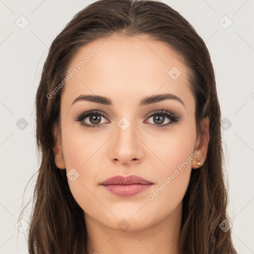 Neutral white young-adult female with long  brown hair and brown eyes