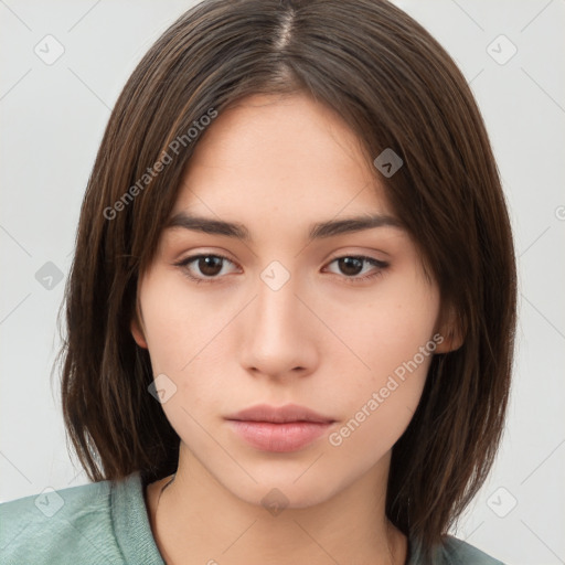 Neutral white young-adult female with medium  brown hair and brown eyes