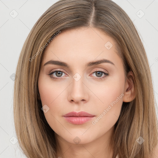 Neutral white young-adult female with long  brown hair and brown eyes