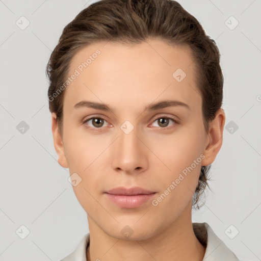 Neutral white young-adult female with short  brown hair and brown eyes