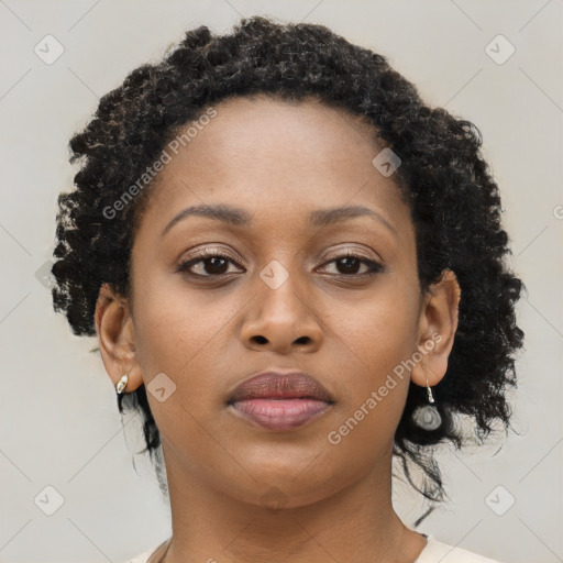 Neutral black young-adult female with short  brown hair and brown eyes