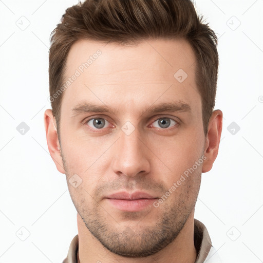 Neutral white young-adult male with short  brown hair and grey eyes