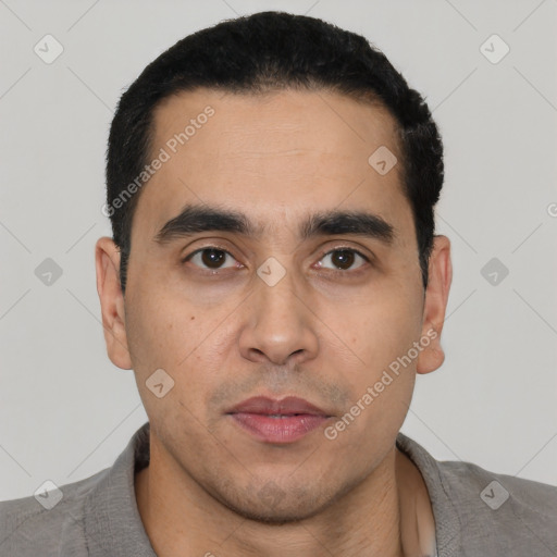 Neutral latino young-adult male with short  black hair and brown eyes