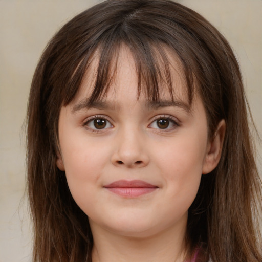 Joyful white child female with long  brown hair and brown eyes