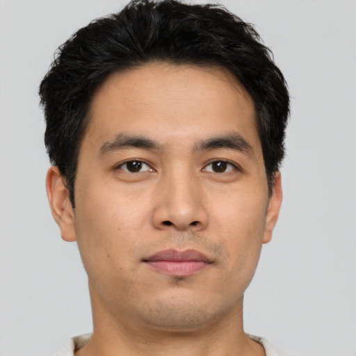 Neutral asian young-adult male with short  brown hair and brown eyes