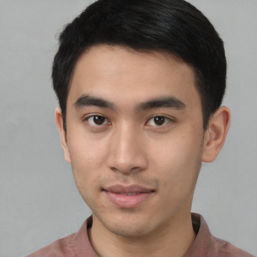 Neutral white young-adult male with short  black hair and brown eyes