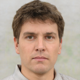 Neutral white young-adult male with short  brown hair and grey eyes