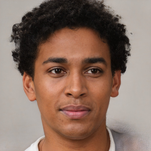 Neutral latino young-adult male with short  brown hair and brown eyes