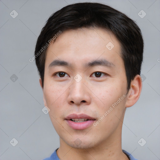 Neutral asian young-adult male with short  brown hair and brown eyes